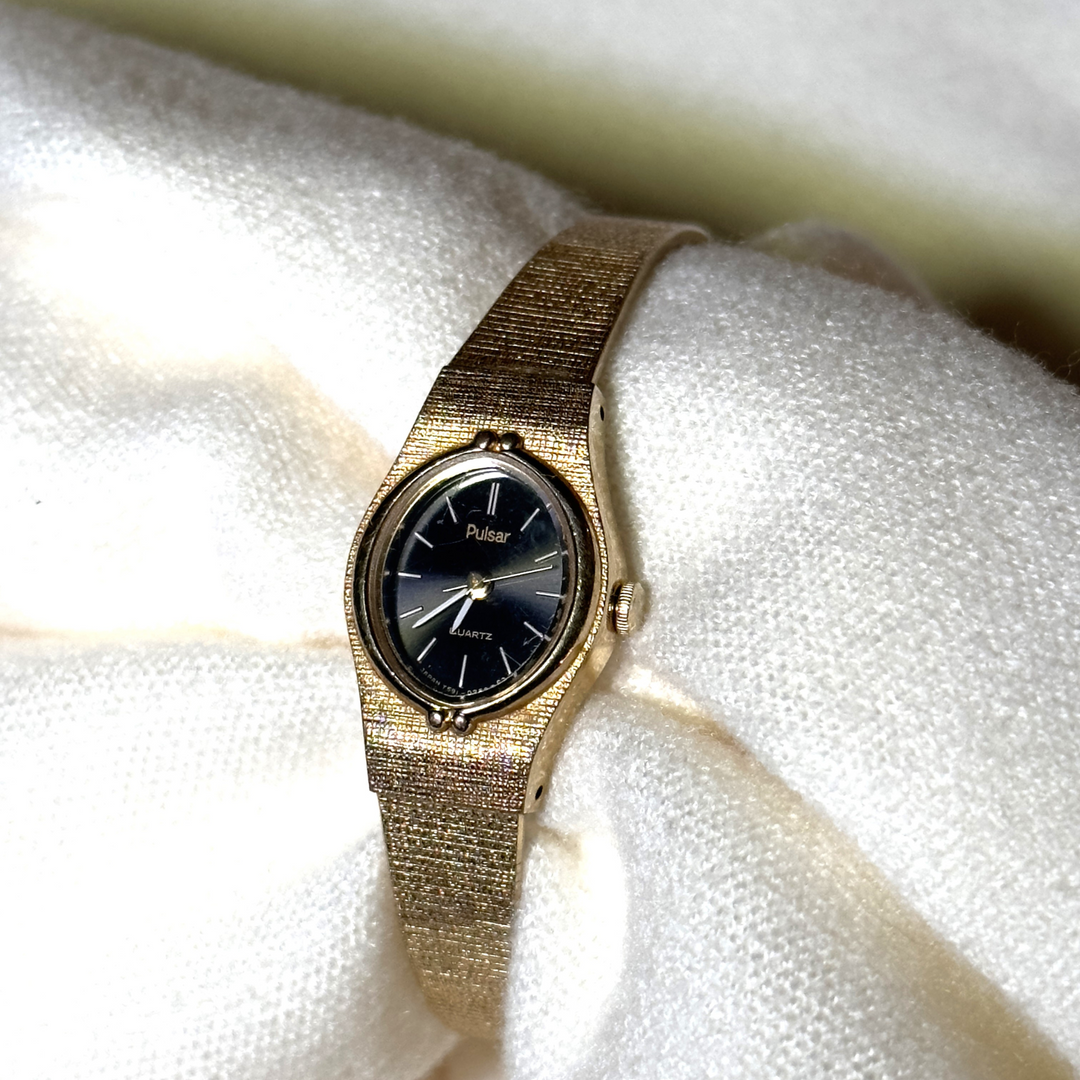 Vintage Pulsar Gold watch with Oval Black Face